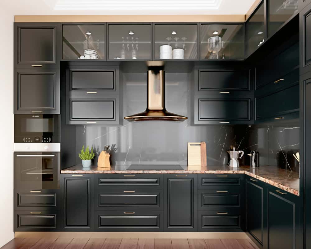 Glossy eclectic kitchen designs featuring dark cabinets and bronze chimney hood