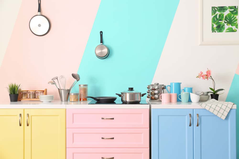 Modern Practical Kitchen Designs with colorful pastel cabinets and cookware