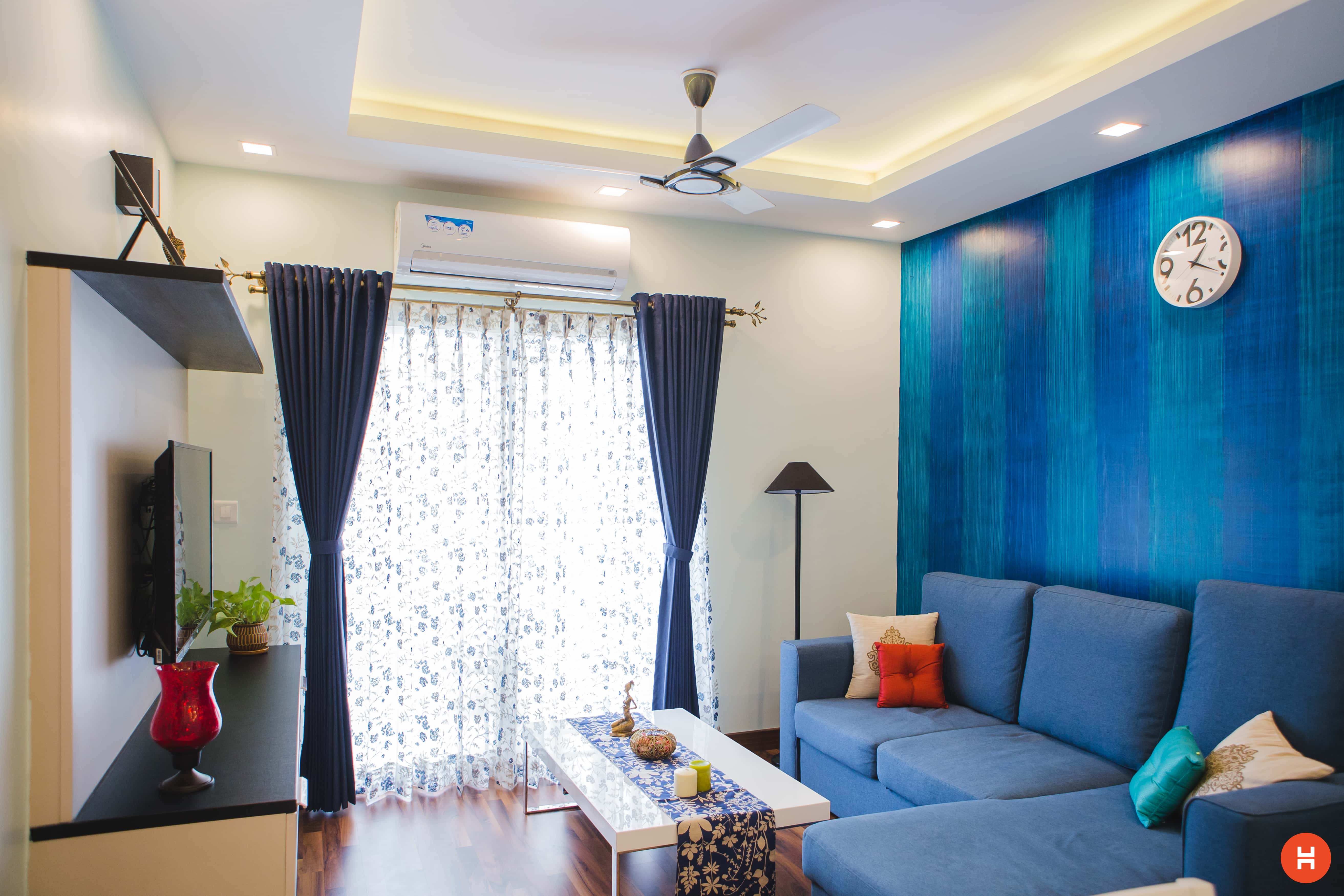 Blue theme living room with Wooden Flooring
