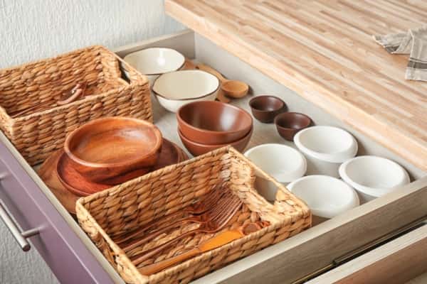 Smart storage ideas in trendy kitchen designs with wooden drawer
