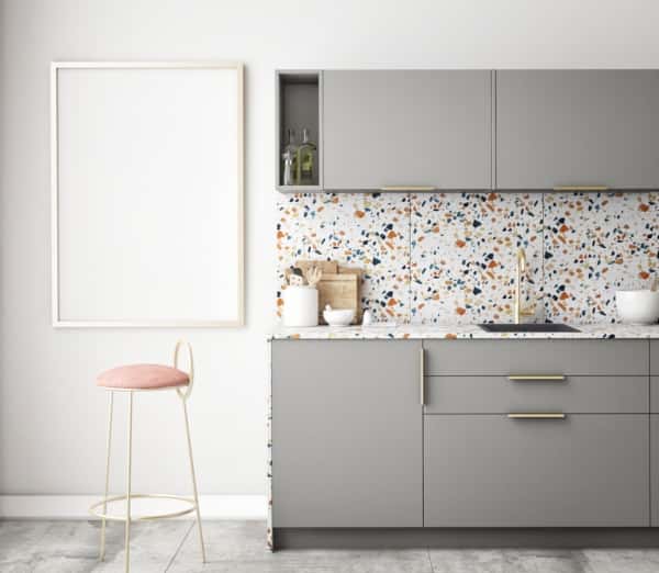 Trendy kitchen designs with terrazzo backsplash and modern cabinets