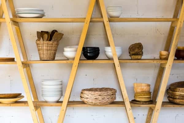 Minimalist Trendy Kitchen Designs with open wooden shelves and ceramic bowls