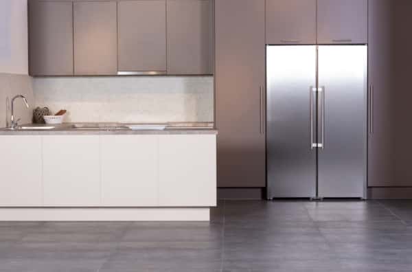 Minimalist Trendy kitchen designs with sleek cabinets and modern refrigerator