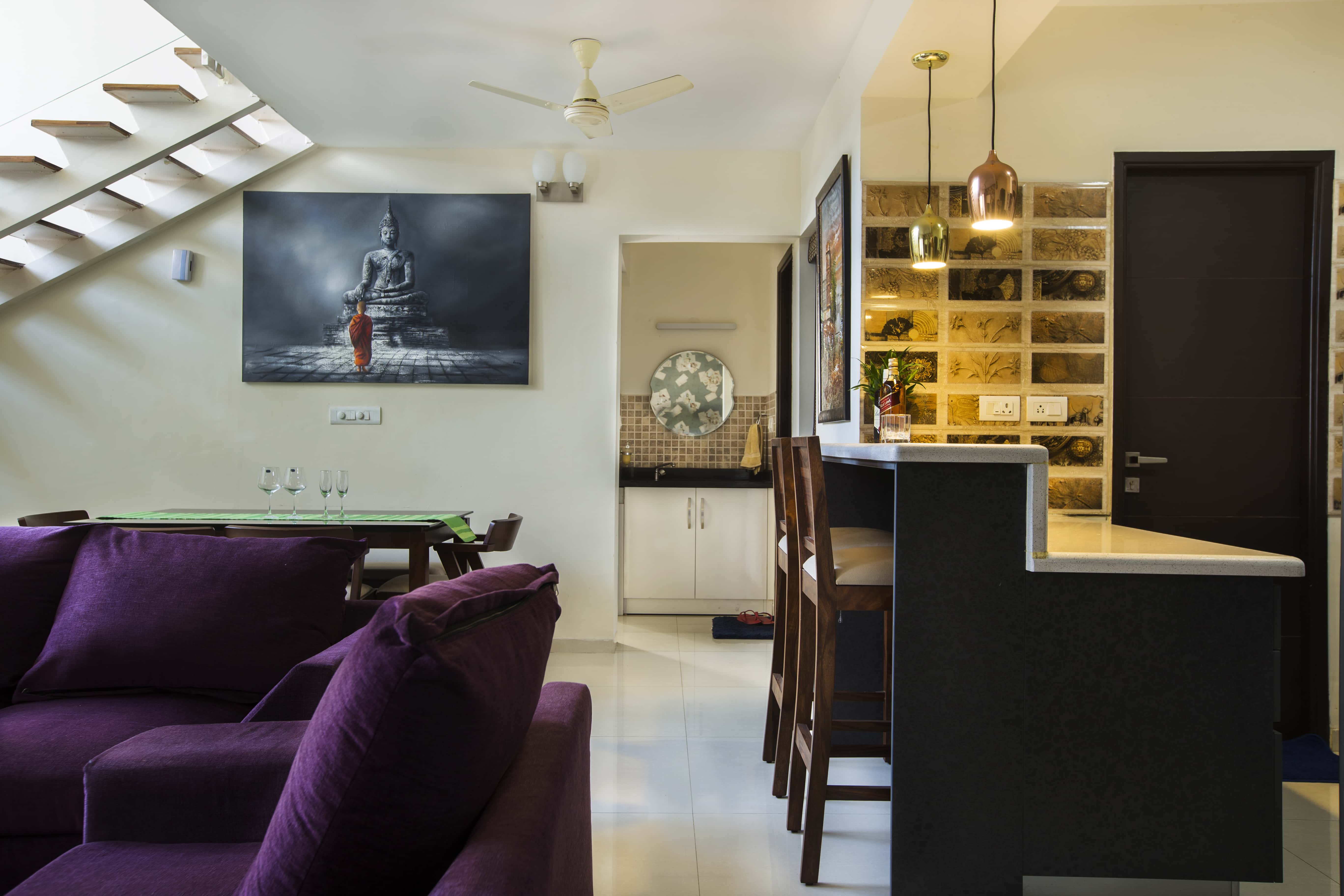 kitchen and living room separated by breakfast nook