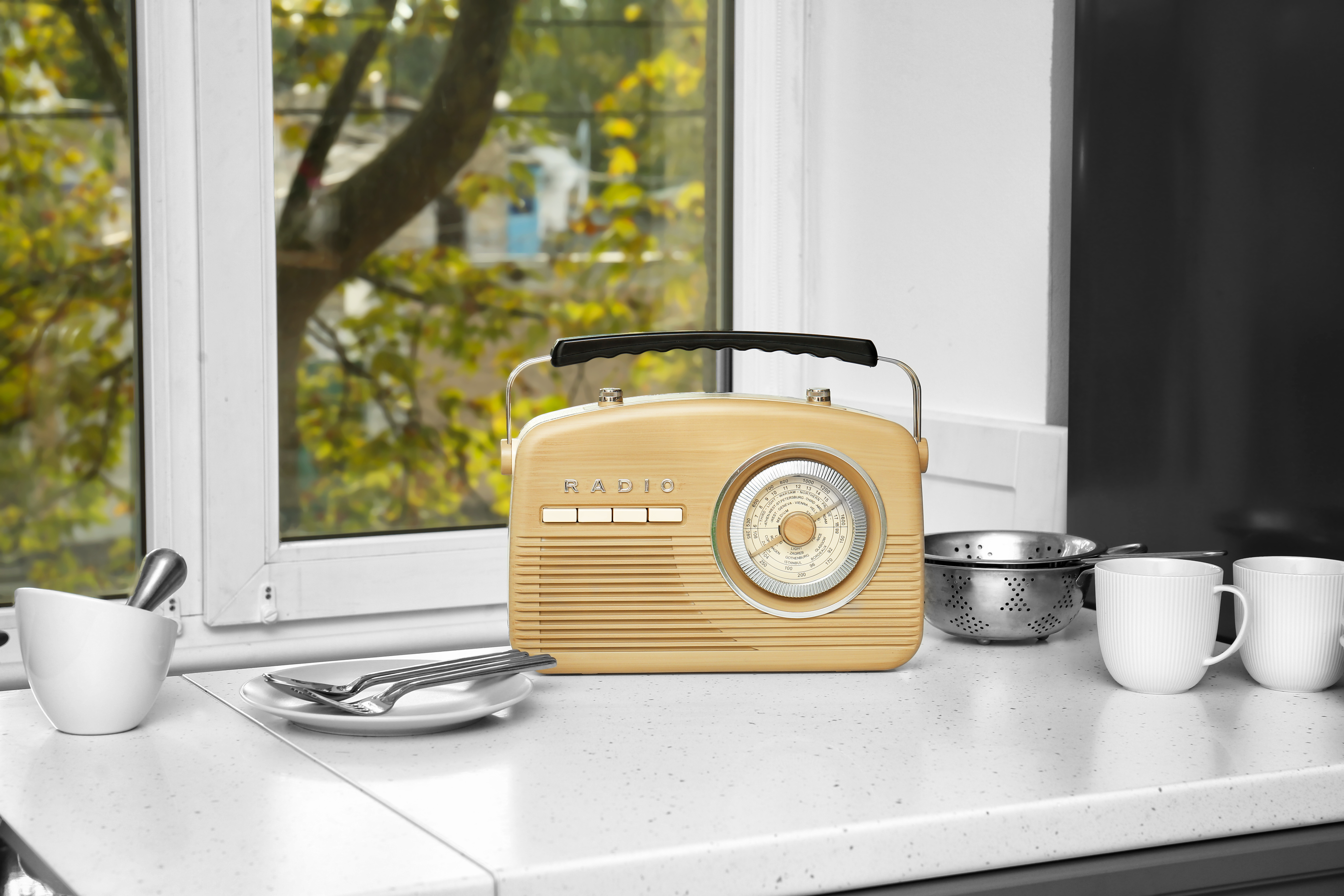 Retro cafe style kitchens with vintage radio and white countertop accessories