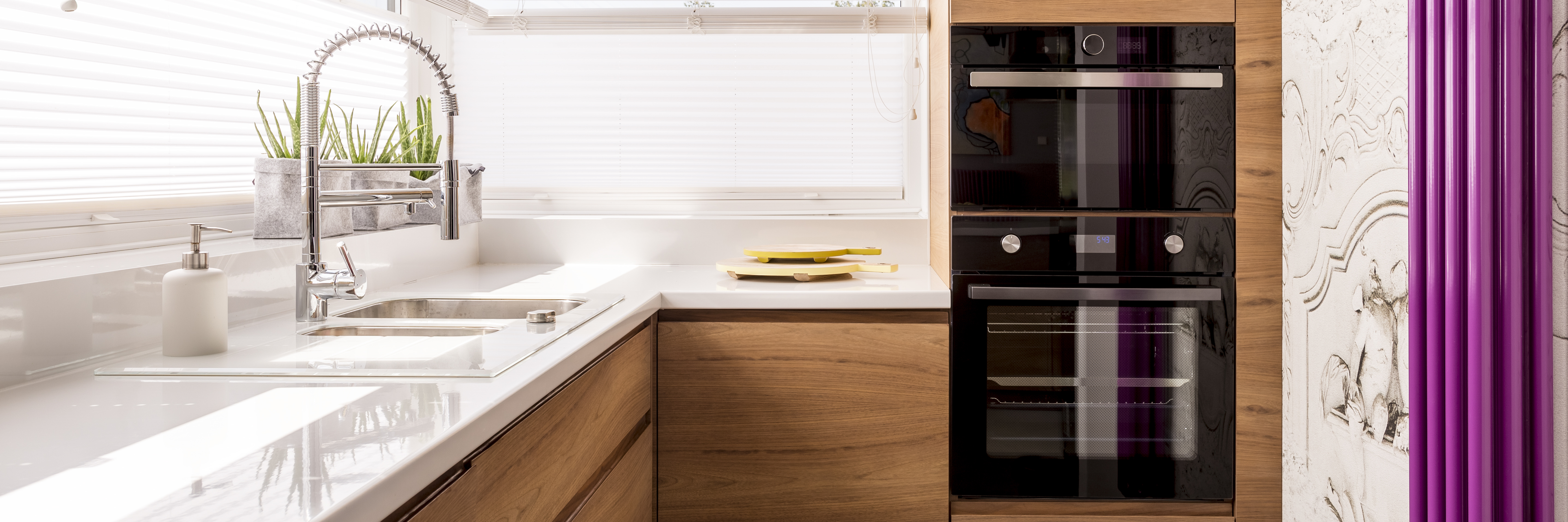 Modern kitchen electrical points planned smartly near oven and sink zone