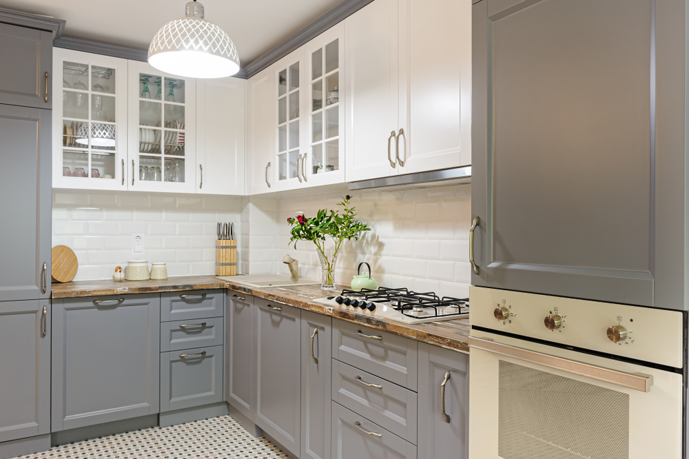 Elegant grey kitchen designs with white upper glass cabinets