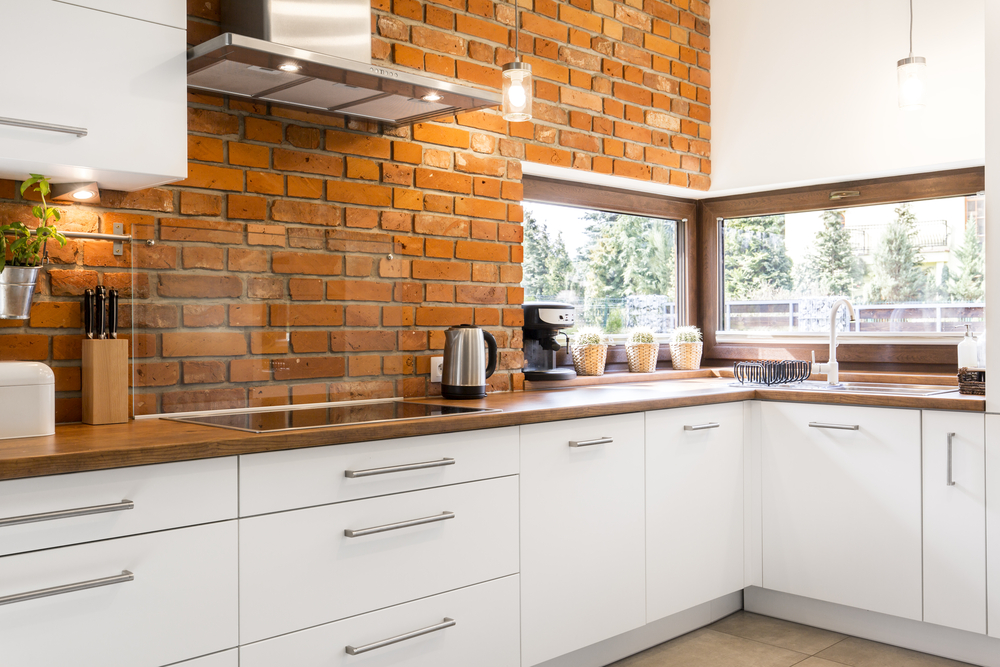 red brick wall kitchen