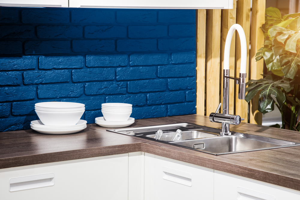Textured brick wall backsplash