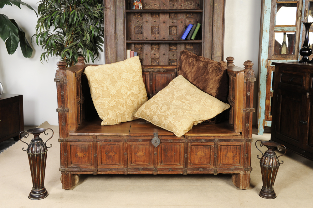 Classic Bengali home decor furniture with rustic wooden sofa and carved details