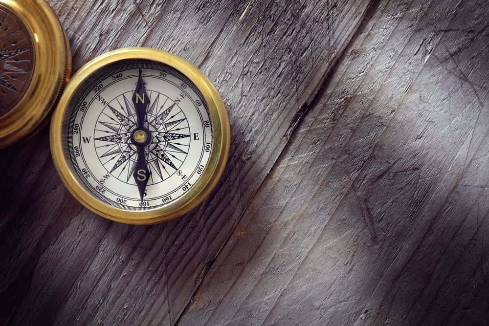 Antique kitchen direction as per vastu shastra tool on rustic wood