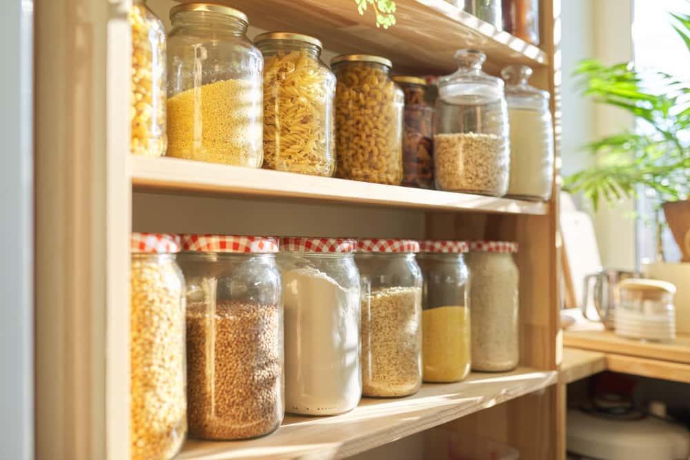 Organised kitchen vastu tips container rack for grains and dry goods