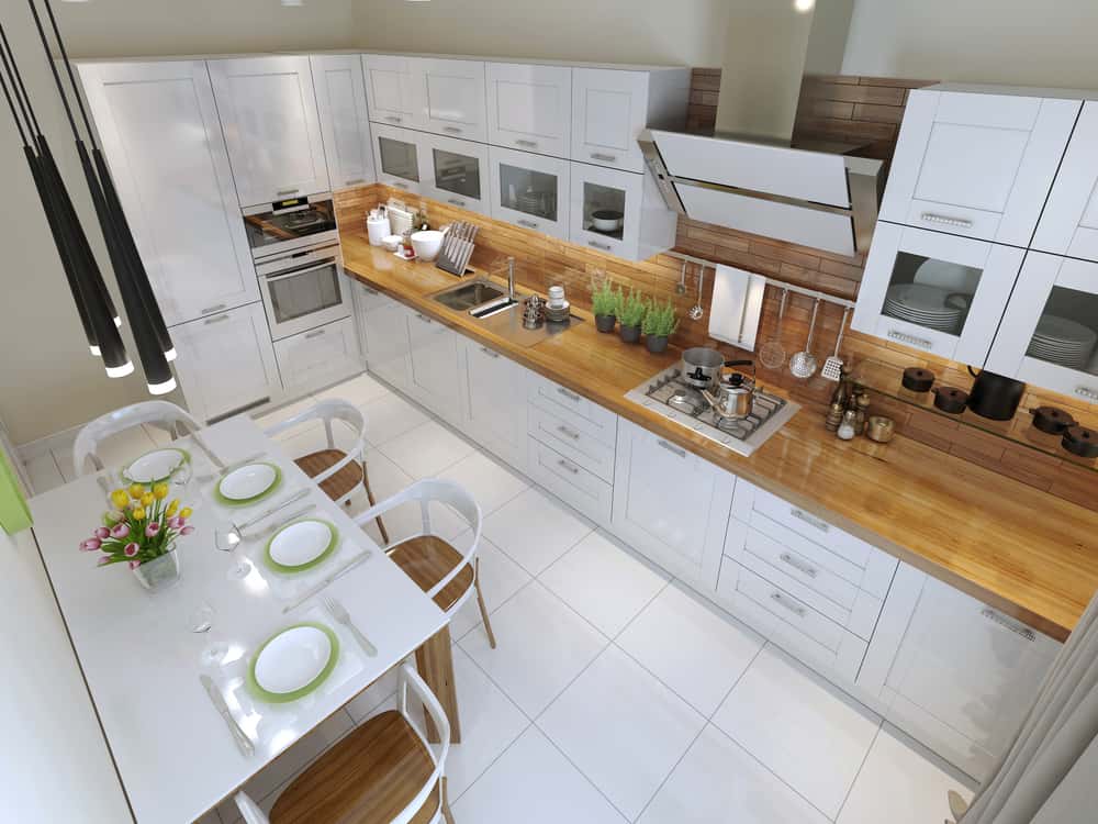 Modern minimalist kitchen designs with white cabinets and wood countertops