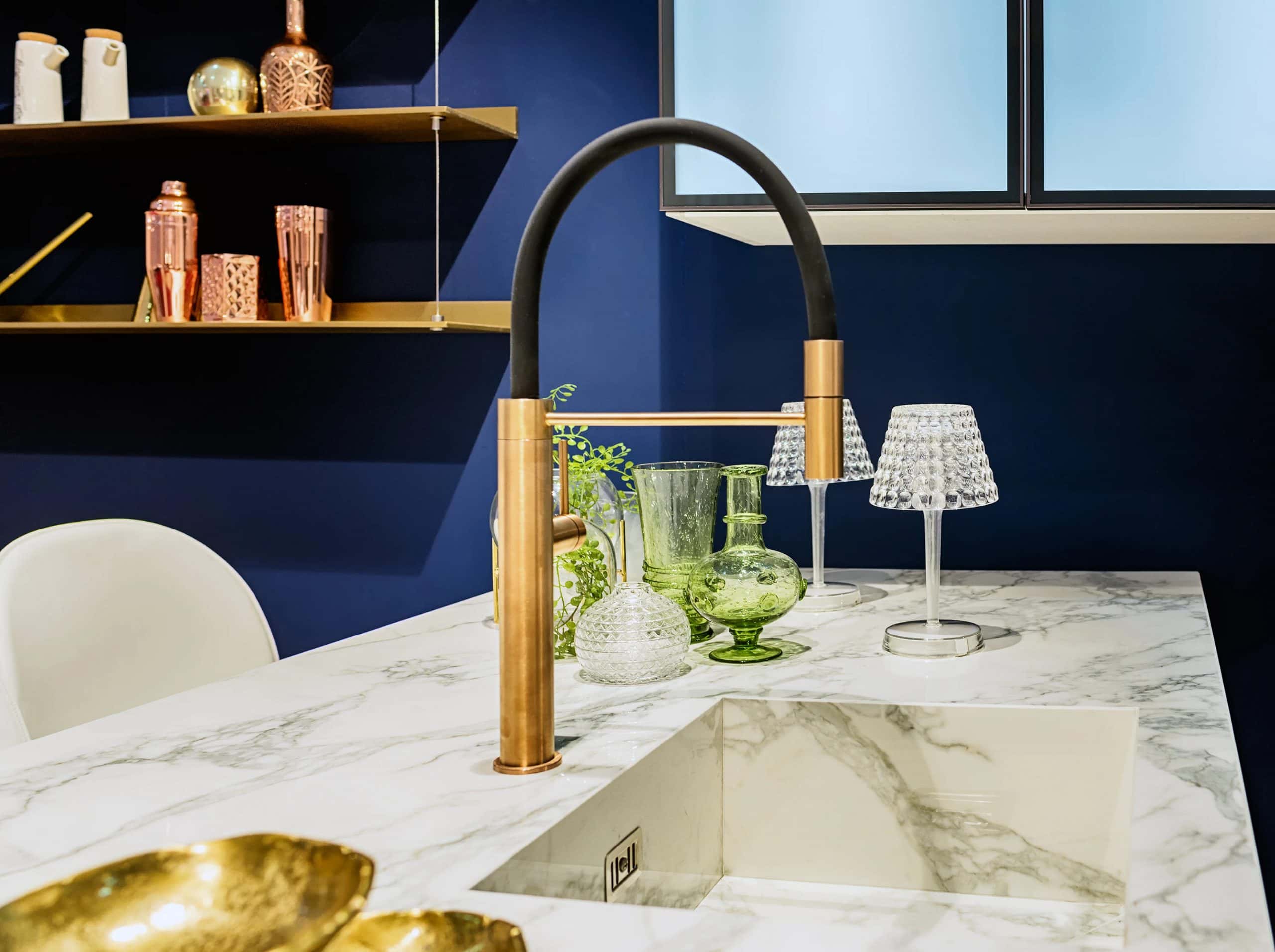 Modular kitchen best colour combination using deep blue with gold and copper accents
