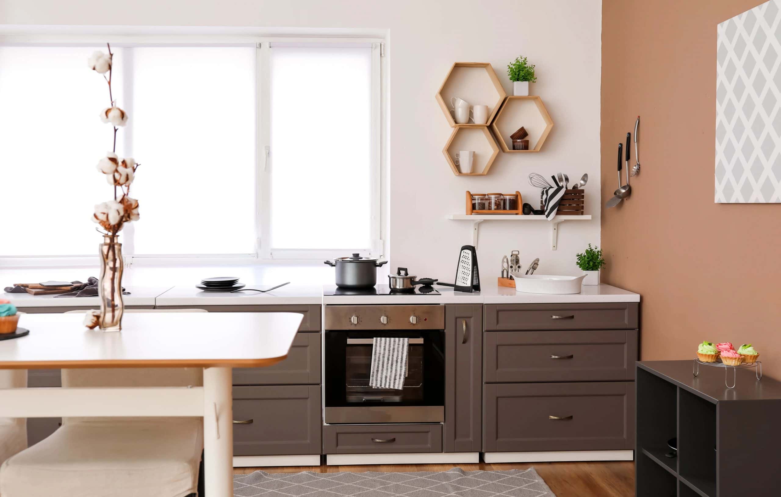 Brown modular kitchen best colour combination with sand and wood tones