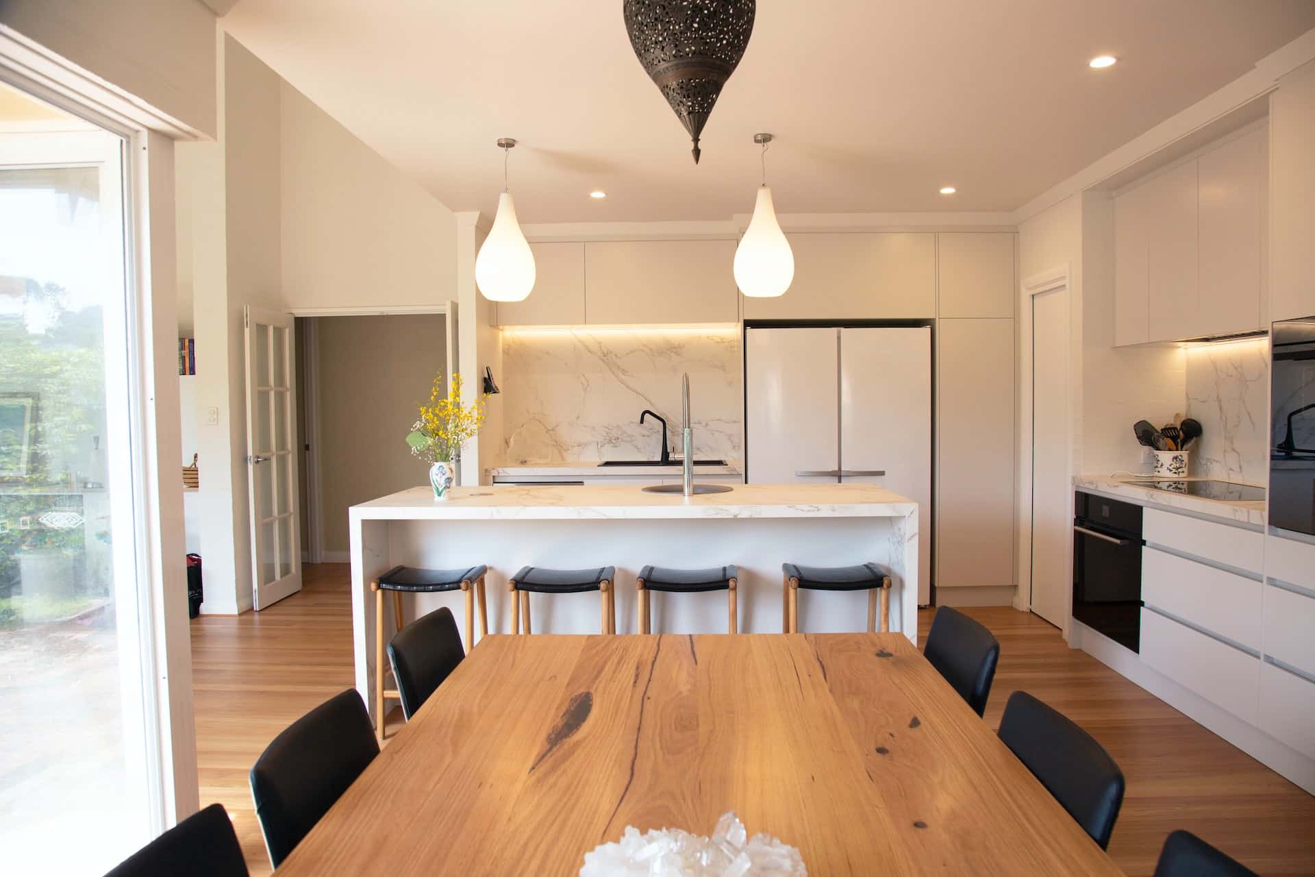 Open Kitchen Design with Stylish Dining Area