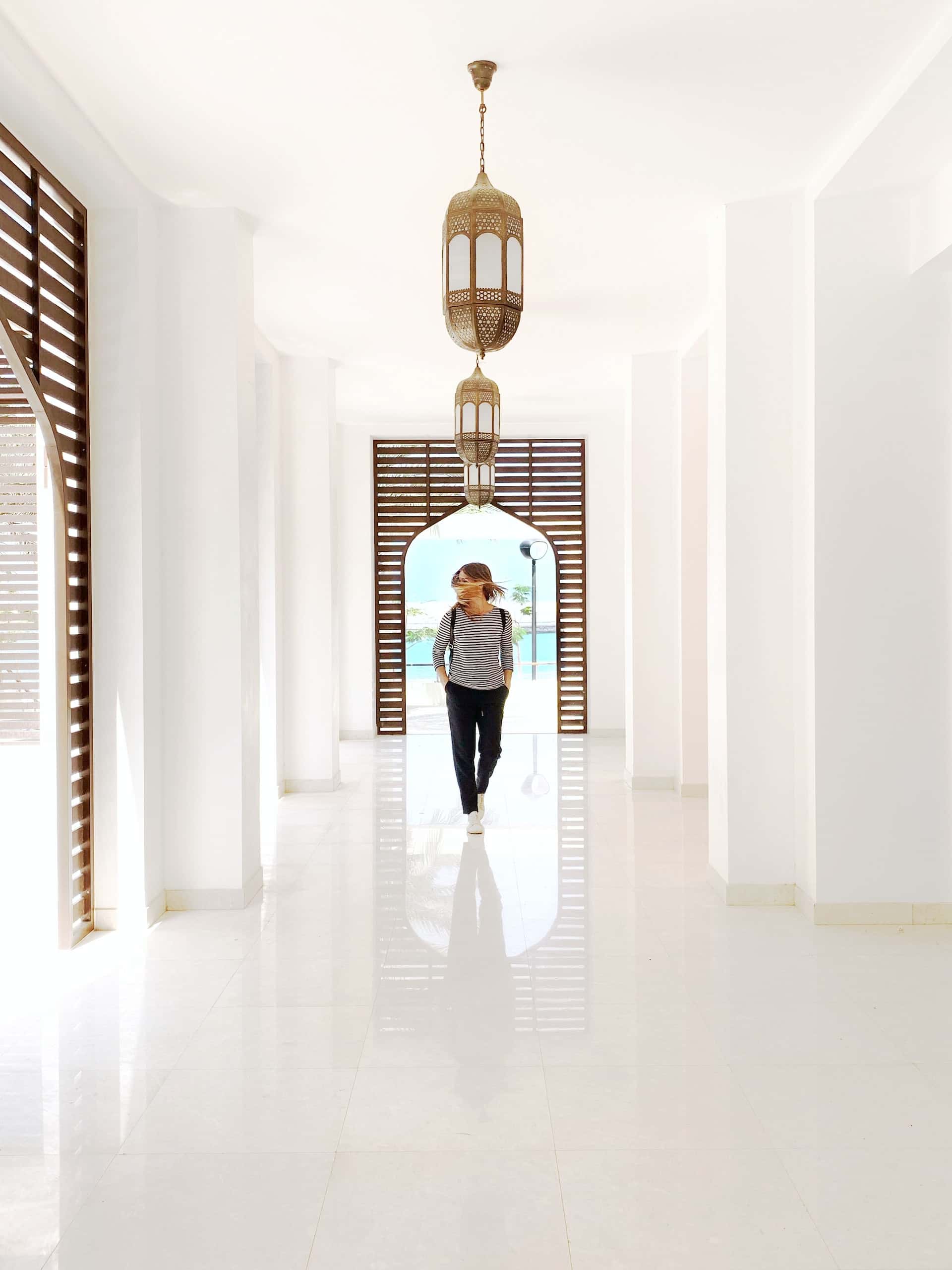 wooden partition arch between living dining rooms