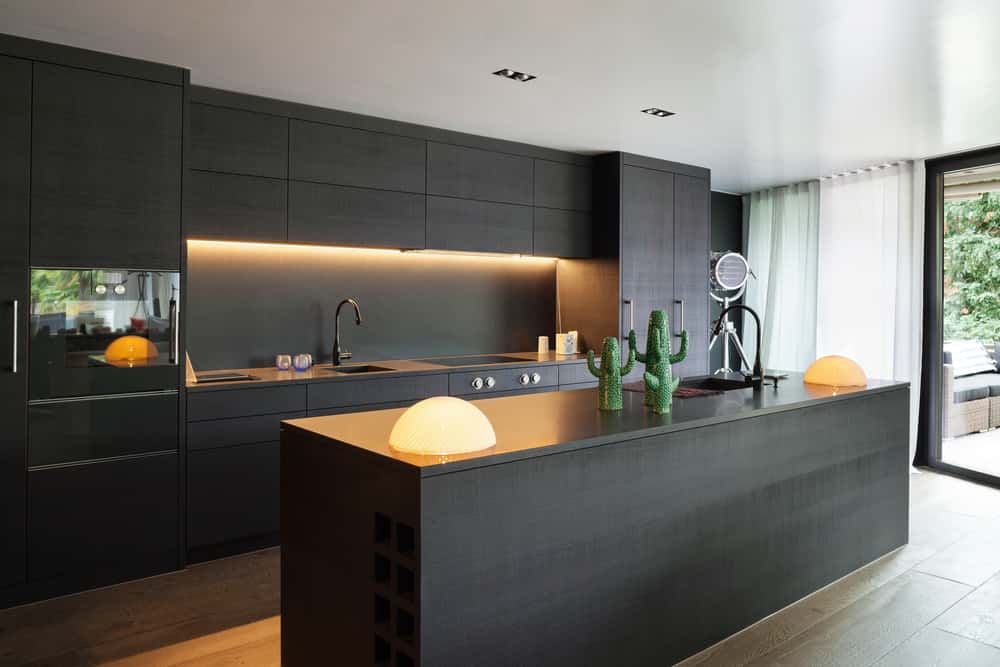 Stylish kitchen island designs with under cabinet lighting idea 