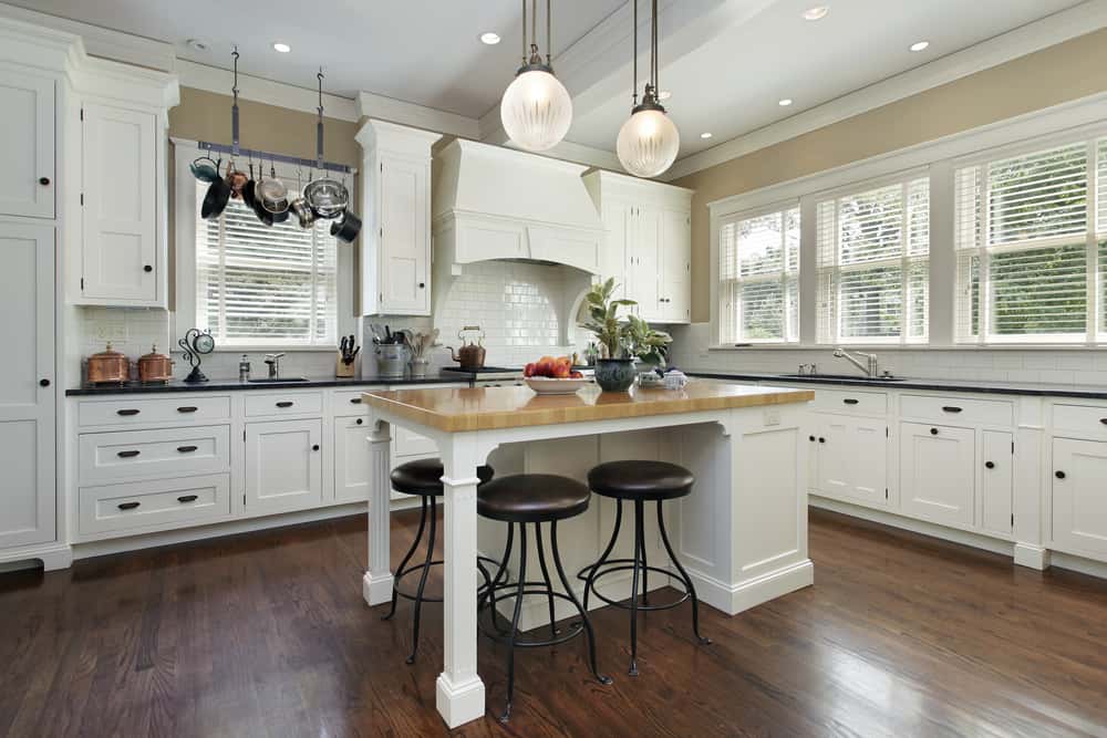 Classic white kitchen island designs with wood countertop ideas