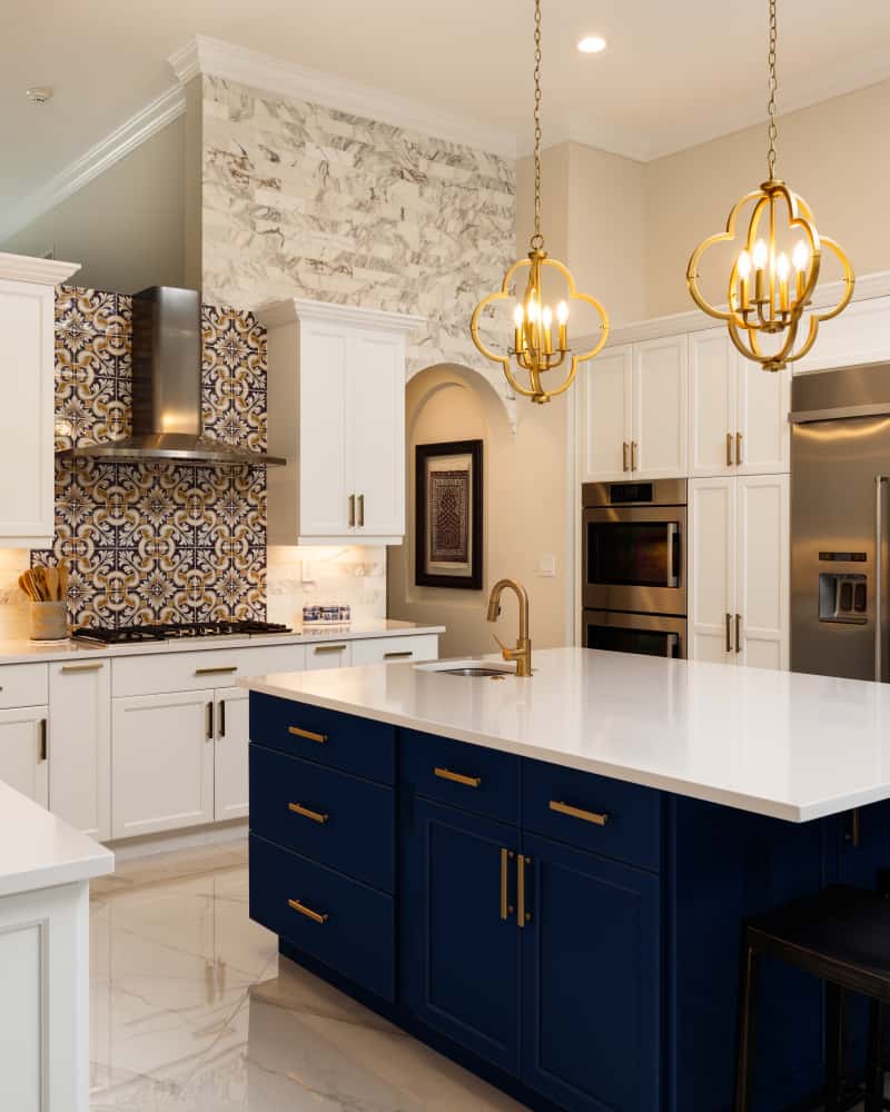 Elegant kitchen island designs with white countertop and gold fixtures 