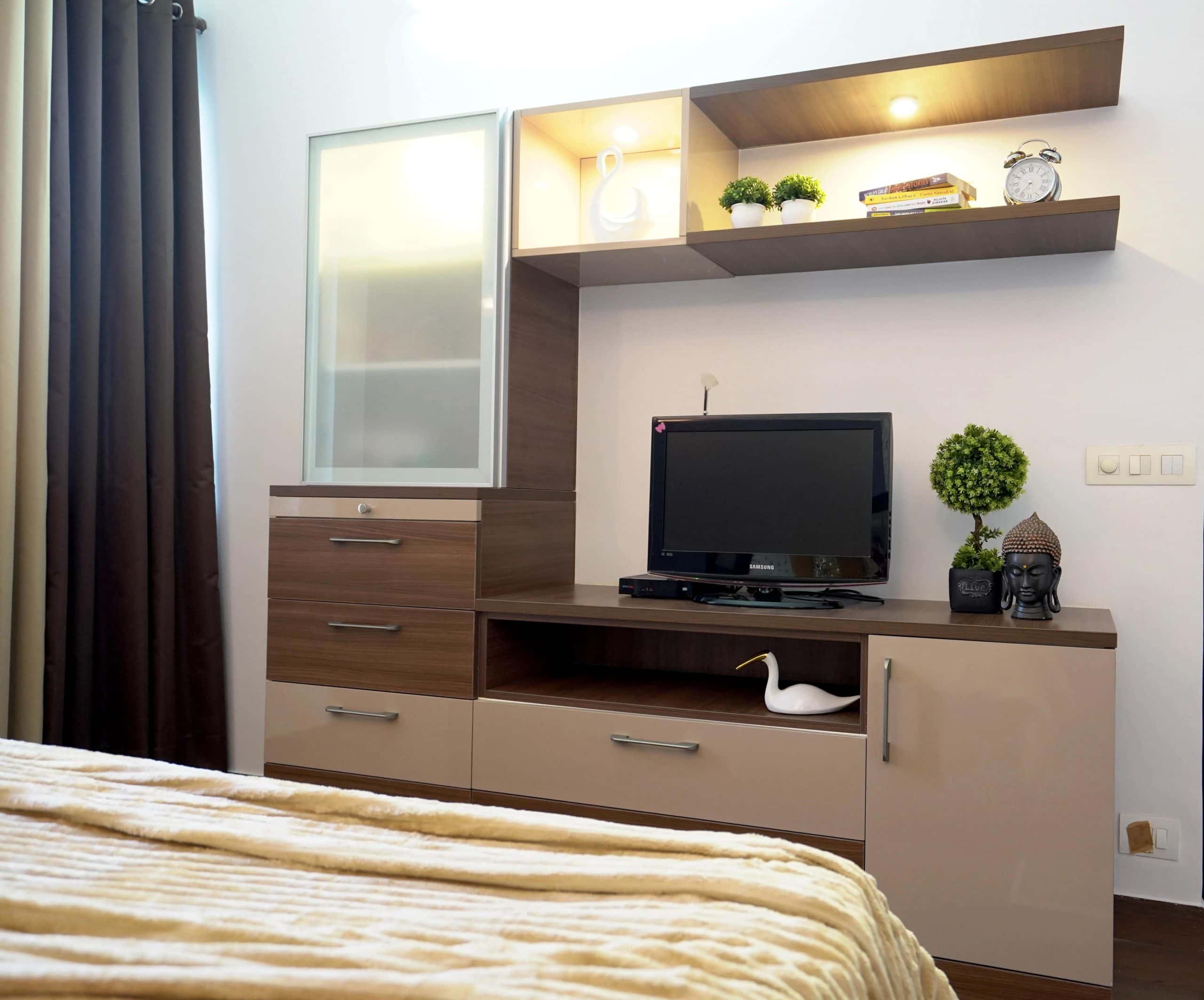 tv cabinet with a pooja cabinet design