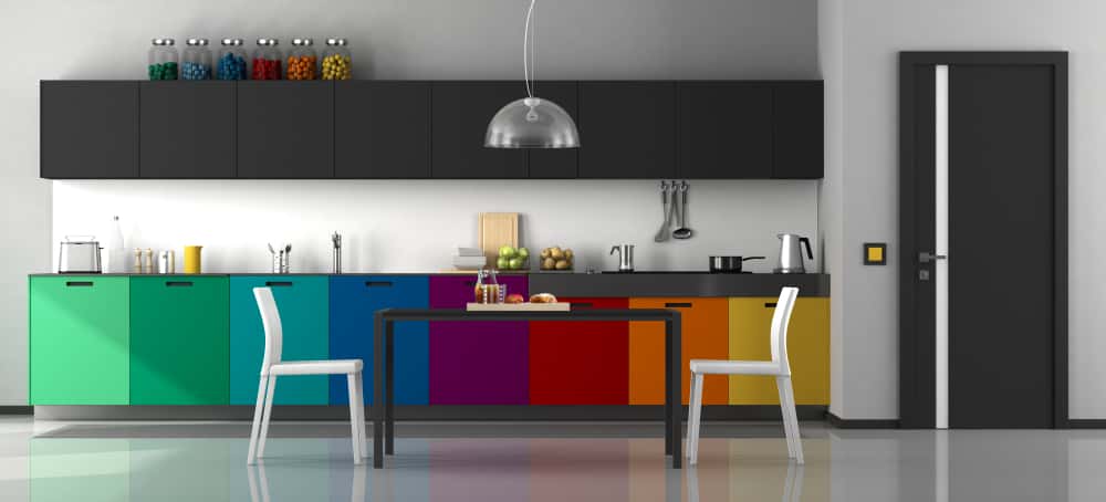 Colorful kitchen cabinet laminate design with vibrant hues of green, purple, red, and orange