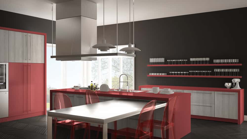 Bold kitchen laminate designs with coral red accents and matte black contrast walls