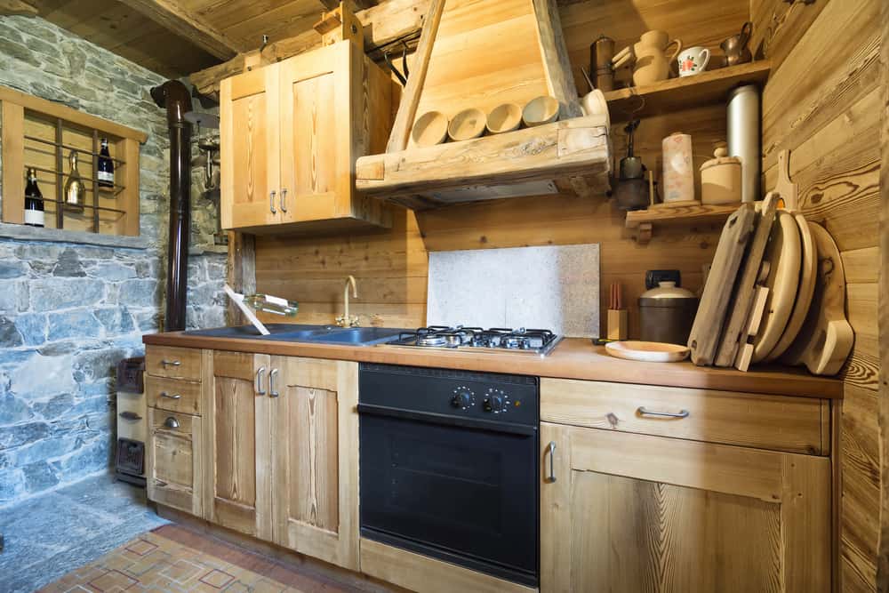  Raw wood kitchen style with natural tone cabinet arrangement 