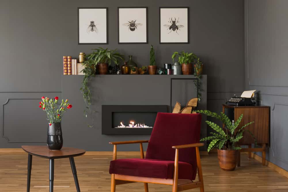 wine colour furniture and grey walls
