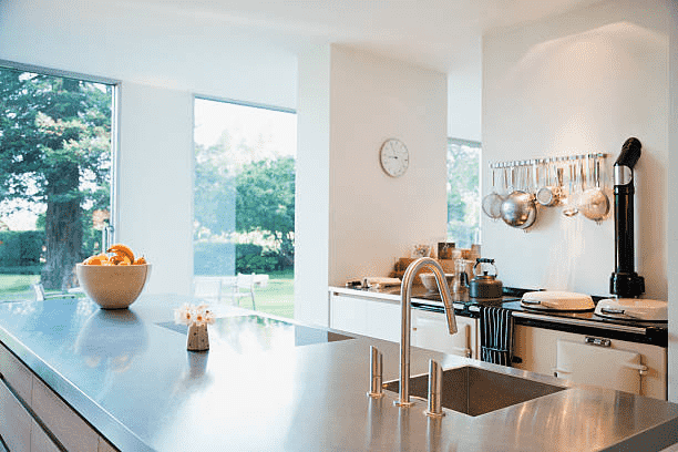 Latest contemporary kitchen design with stainless island and natural light