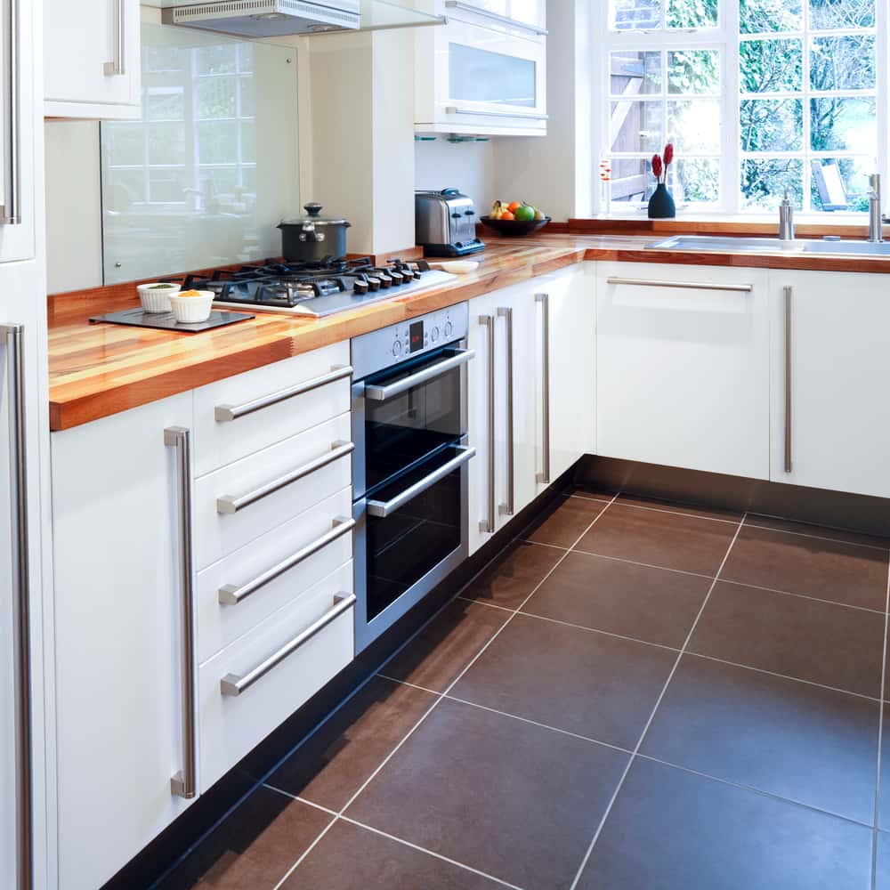 L-shaped modular kitchen designs with natural light and storage