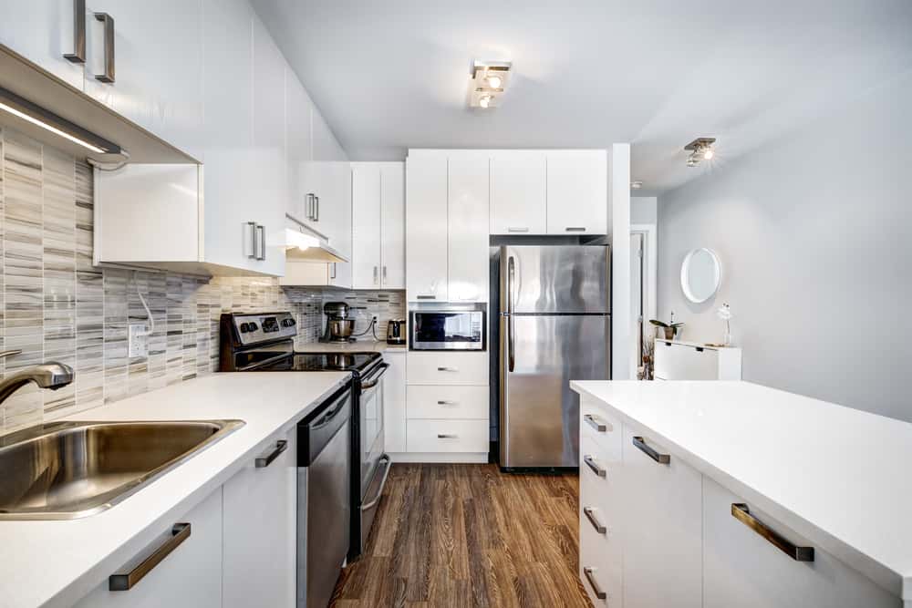 Modern Parallel Kitchen modular design with glossy white cabinets and sleek appliances