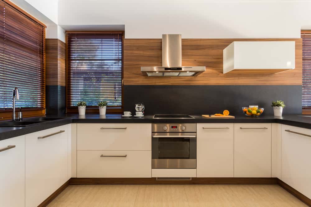 U-shaped kitchen Chic U-shaped kitchen interior design with wood accents and modern appliances