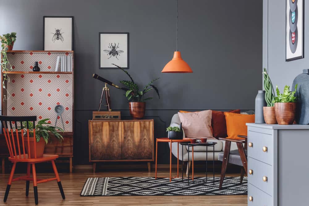 Warm colour combinations with black and rich red-orange interiors
