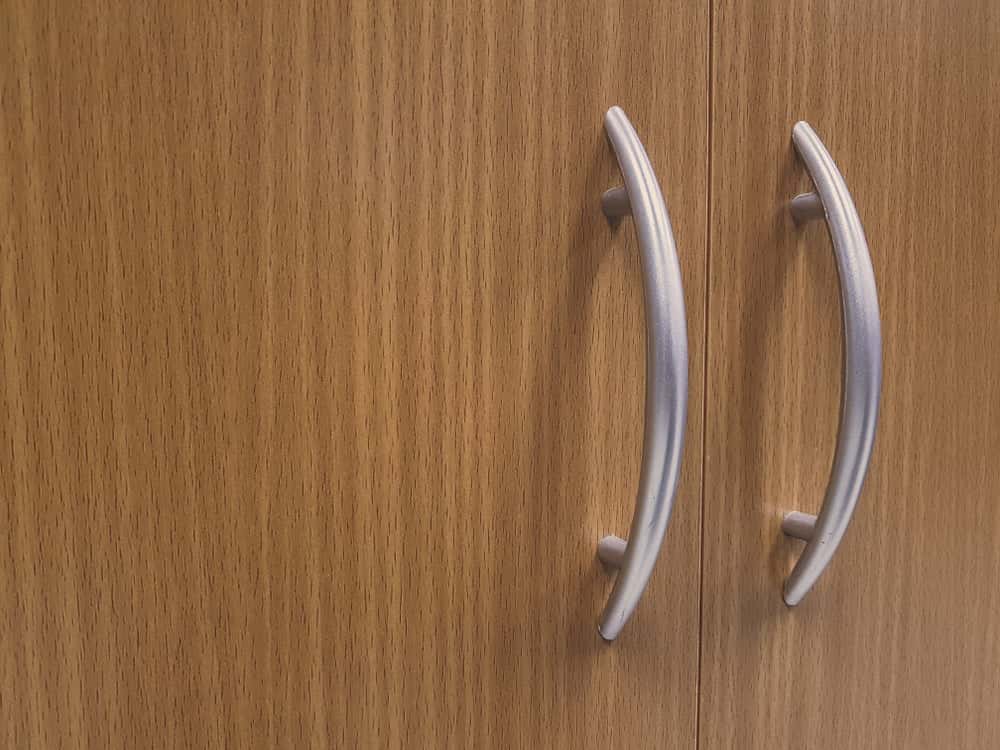 Classic wardrobe handle style with curved silver metal design