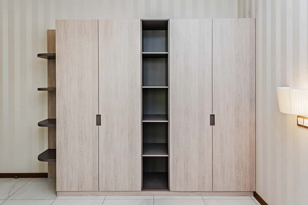 Modern wardrobe handle with built-in recessed grip panel