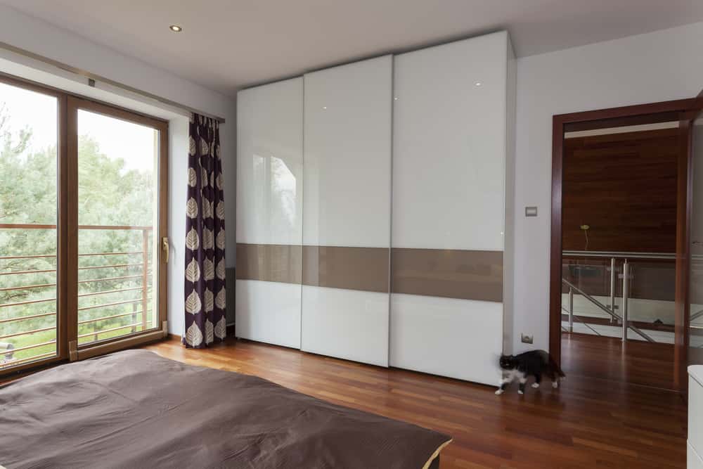 glossy white wardrobe design