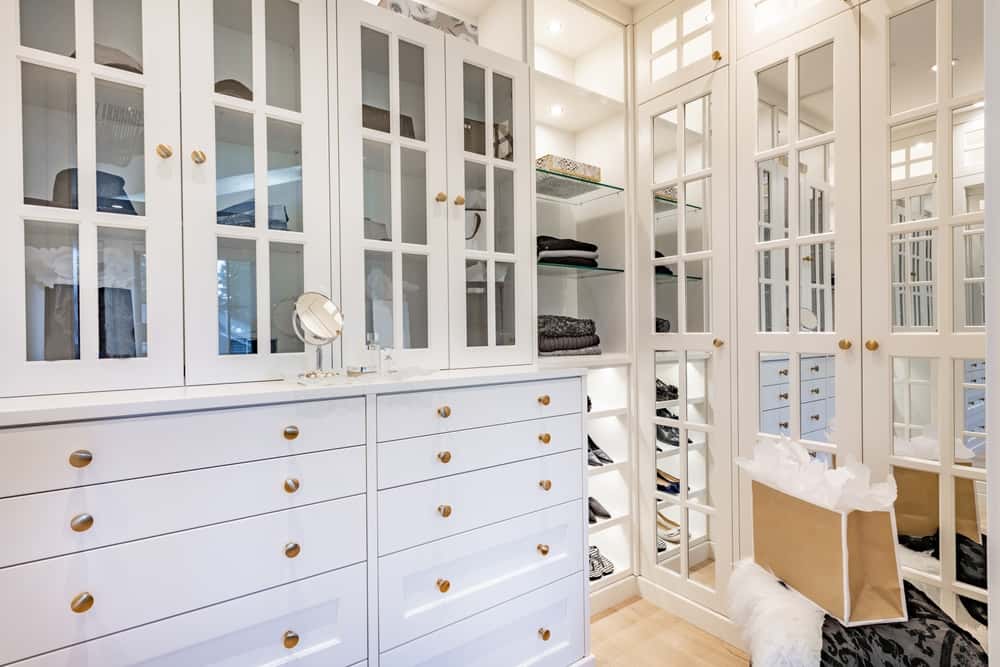 the grand white walk-in closet