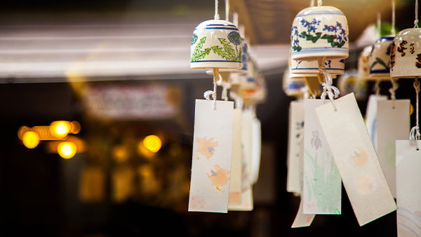Delicate ceramic wind chimes vastu pieces with paper tags for peace and clarity