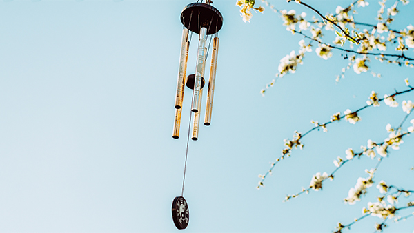 Metal wind chimes vastu element hanging outdoors to welcome fortune and harmony