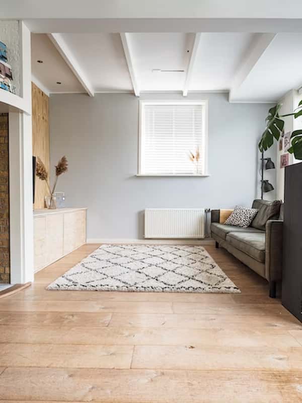 bedroom with light wood floors