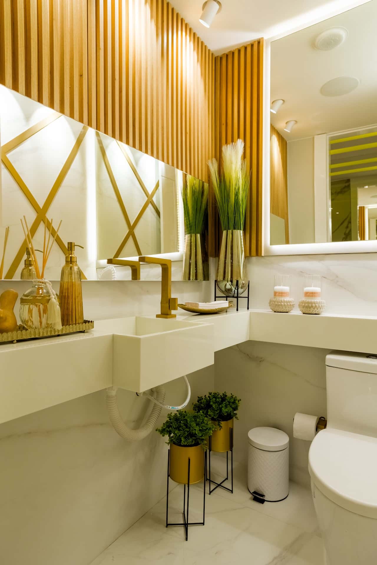 bohemian-themed bathroom with backlit mirror