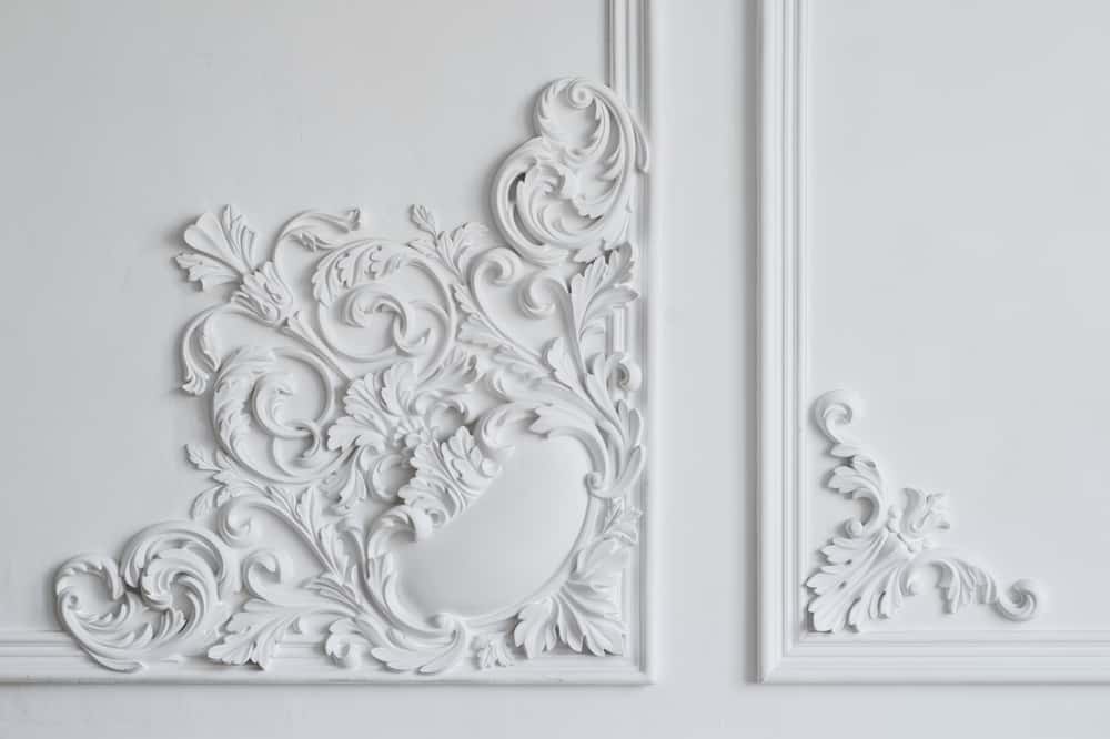 Baroque-style cement ceiling design with floral wall corner relief detailing