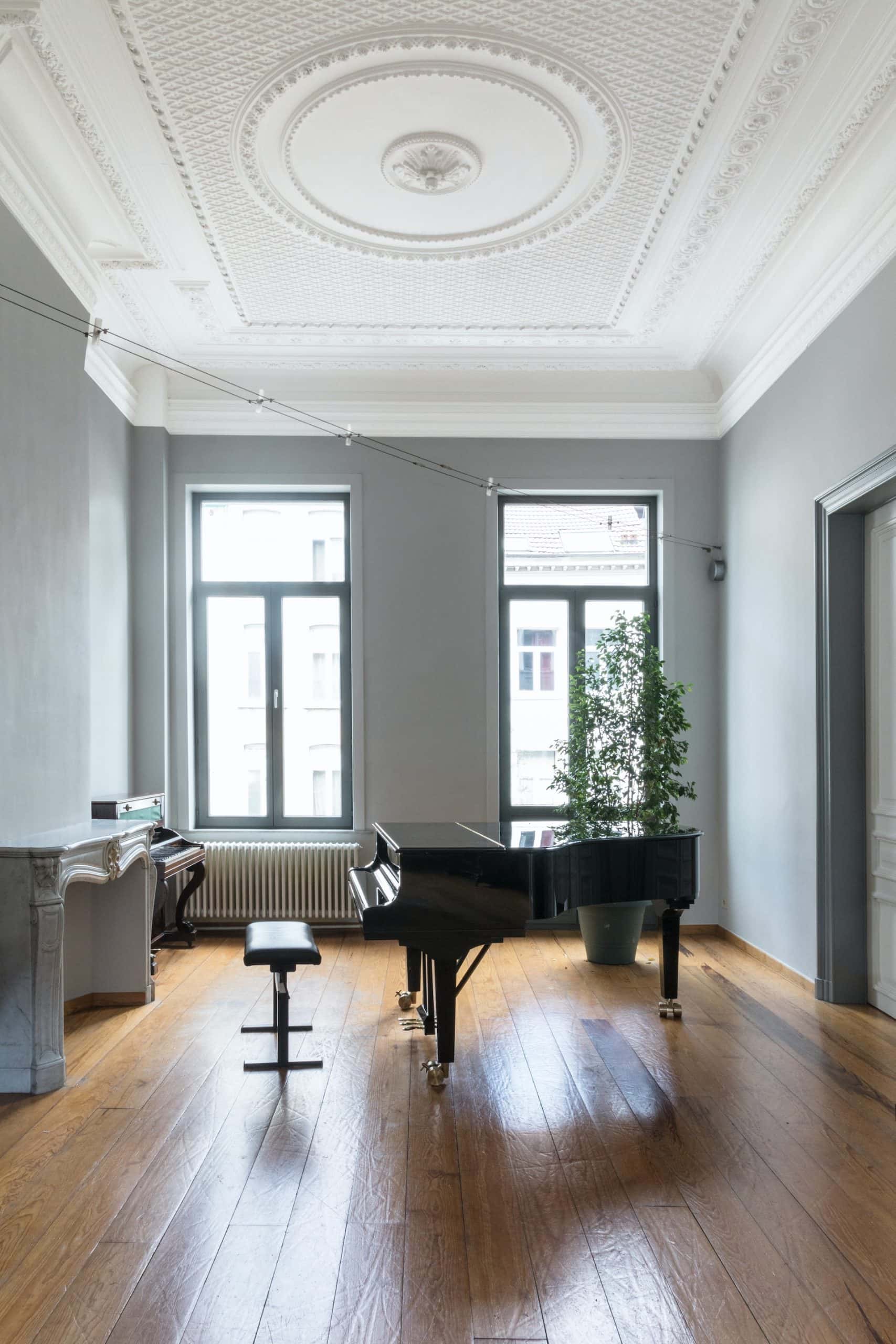 Victorian-style pop design for porch ceiling with intricate circular molding detail