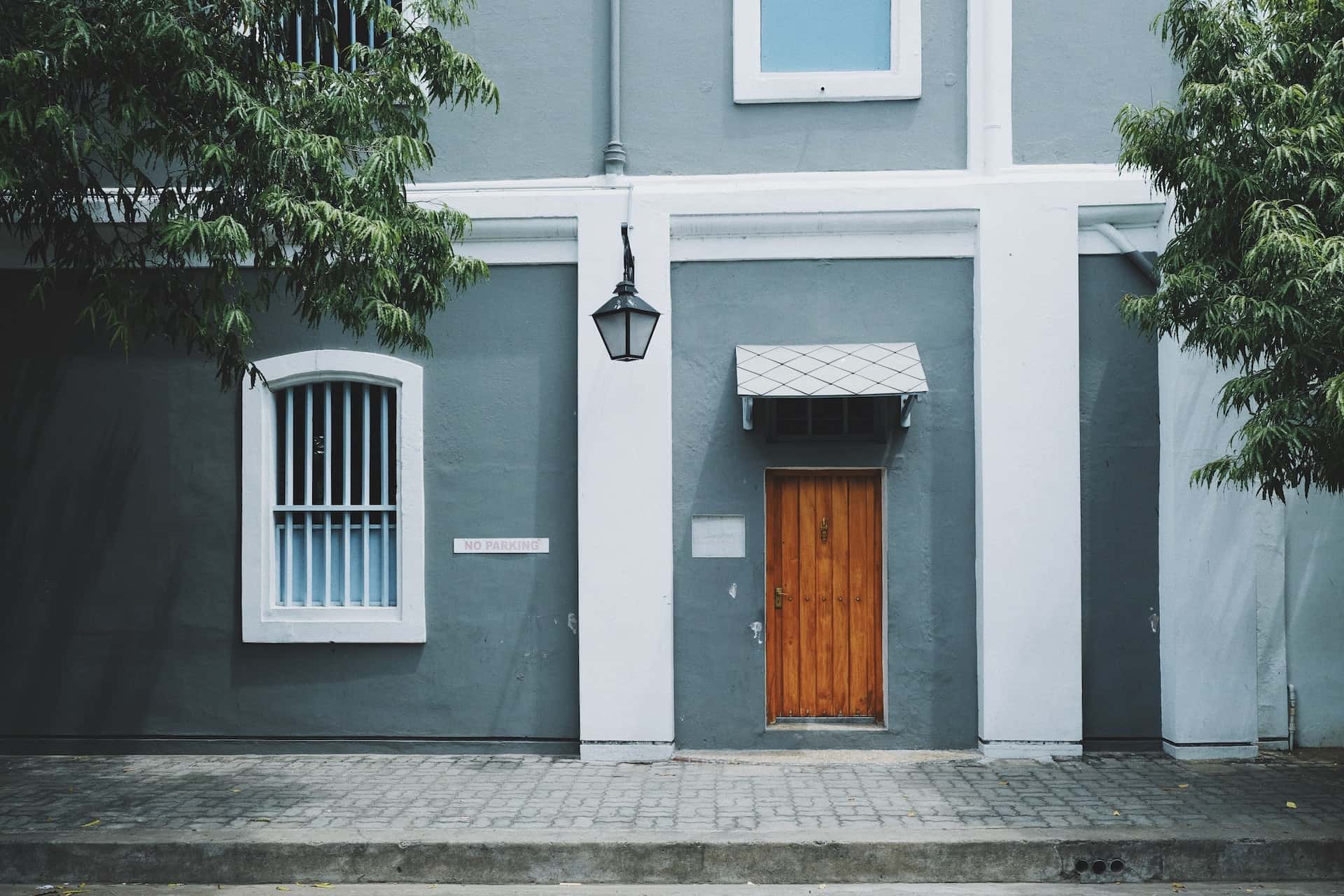 Classic wooden flush door designs for home entrances with elegant exterior styling