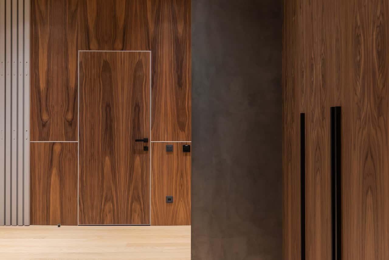 Stylish flush door designs with wood veneer finish for a modern and elegant home interior