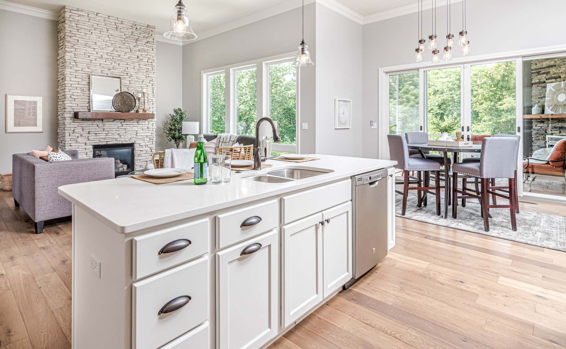 Bright standard kitchen size island with sink in open living space