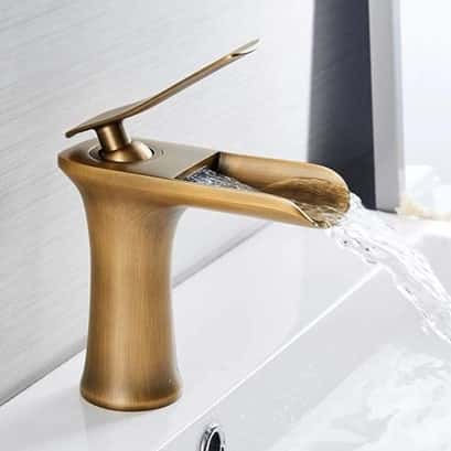 Kitchen tap designs featuring waterfall spout in brushed bronze