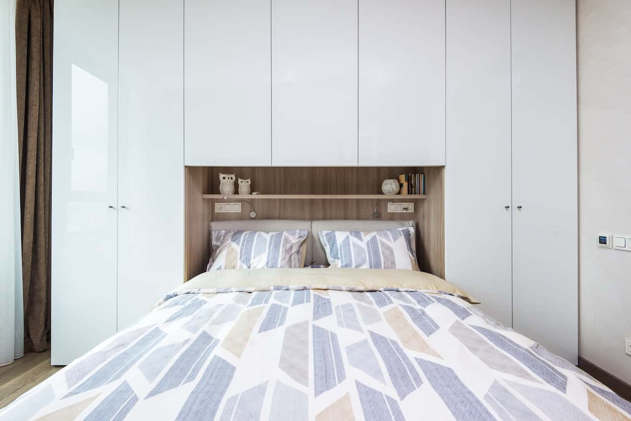 storage cabinet with folding bed design