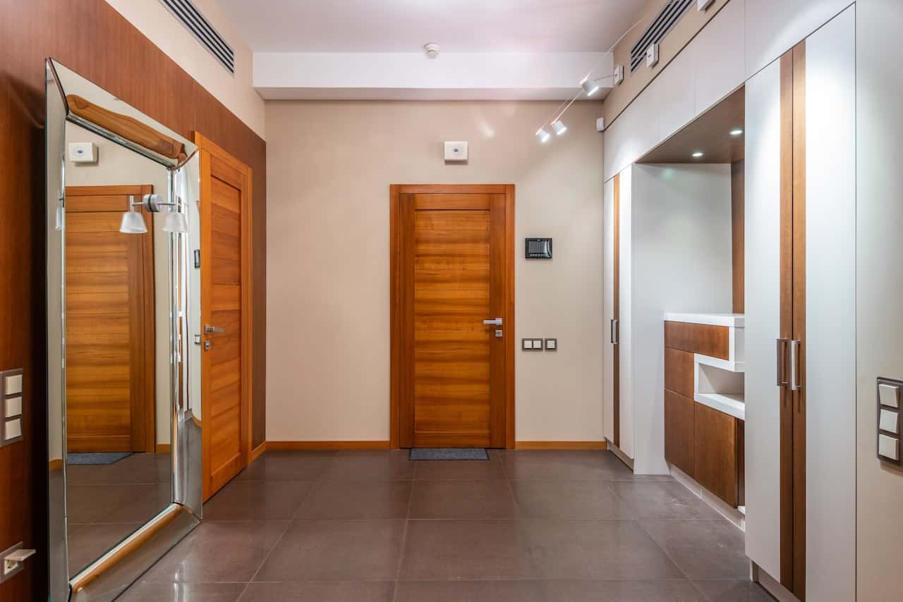 Elegant flush door designs in polished wood for stylish modern home interiors